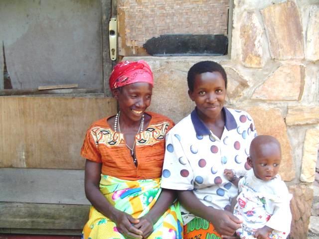 Some months later, Evyonne came to visit with their first child; grandma looking on